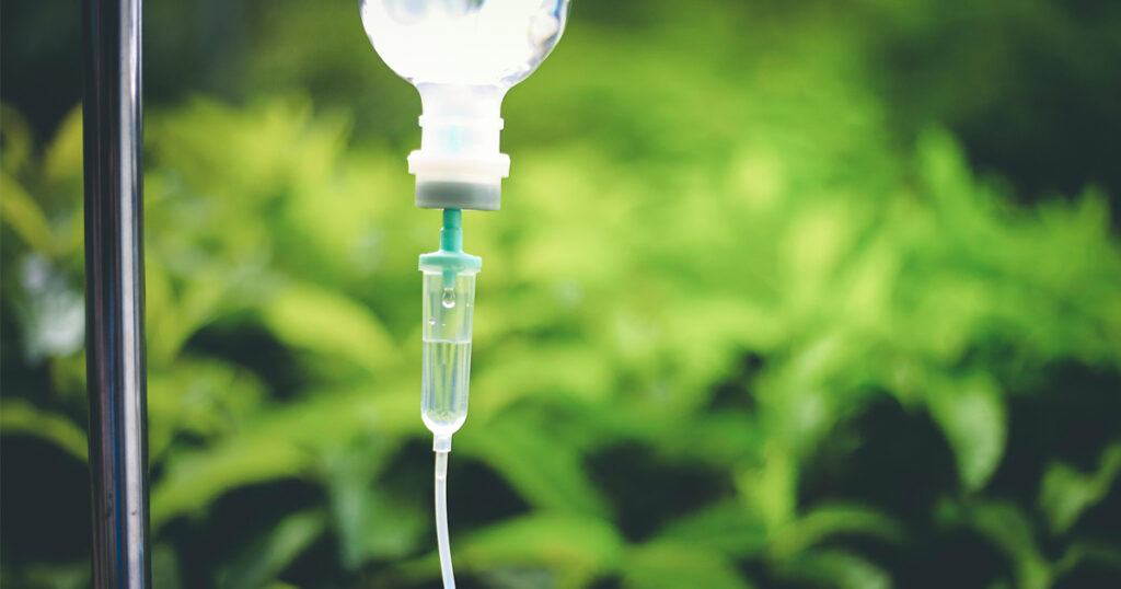 An overview of intravenous therapy with IV bags and tubing visible.